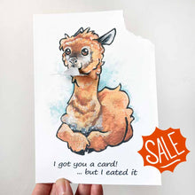 Load image into Gallery viewer, a greeting card with art of an alpaca. text reads, "i got you a card! ... but i eated it". the top right corner of the card is ripped off and hangs from the alpaca's mouth
