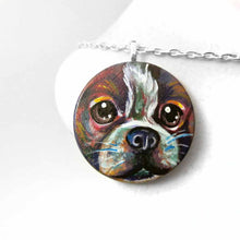Load image into Gallery viewer, a wood disc is hand painted with a portrait of a boston terrier dog in rainbow colours. it's available as a wood keepsake, magnet or pendant necklace
