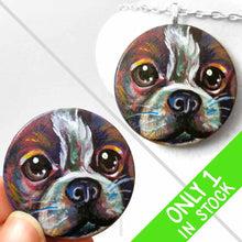 Load image into Gallery viewer, a wood disc is hand painted with a portrait of a boston terrier dog in rainbow colours. it's available as a wood keepsake, magnet or pendant necklace
