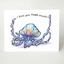 Load image into Gallery viewer, A greeting card, printed with art of blue and purple jellyfish, with two tentacles spread apart, it reads, "i love you THIS much!"
