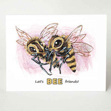Load image into Gallery viewer, A greeting card reads, "Let's BEE friends!" with an illustration of two bees flying next to each other.
