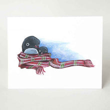 Load image into Gallery viewer, A holiday card with art of a penguin and baby penguin, with a large red plaid scarf wrapped around them.
