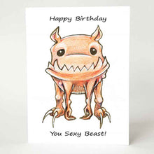 Load image into Gallery viewer, a greeting card, featuring an illustration of an orange creature with sharp fangs. text reads, "Happy Birthday You Sexy Beast!"
