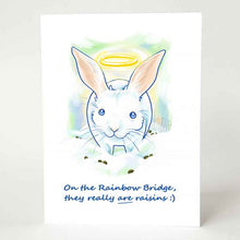Load image into Gallery viewer, greeting card, illustrated with a whtie rabbit with a halo, sitting on the clouds, surrounded by what looks like rabbit poop. the front reads, "On the Rainbow Bridge, they really ARE raisins :)"
