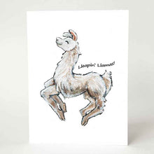 Load image into Gallery viewer, A greeting card, printed with an illustration of a smiling white and brown llama jumping, with the words "Lleapin' Llamas!"
