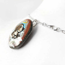 Load image into Gallery viewer, a small beach stone hand painted with the portrait of a beagle as an angel in the clouds, available as a keepsake or pendant necklace
