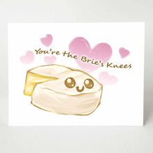 Load image into Gallery viewer, a greeting card with an illustration of a wheel of brie, with one slice missing. it has a smiley face on it. Text says "You're the Brie's Knees". with six hearts in the background
