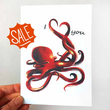 Load image into Gallery viewer, a greeting card illustrated with an octopus. two tentacles making the shape of a heart. text goes around the heart so it says, "I <3 you"
