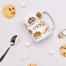 Load image into Gallery viewer, The Cookie Lovers Smile Mug in 15 oz size, includes a print of 10 different cookies with cartoon faces on them
