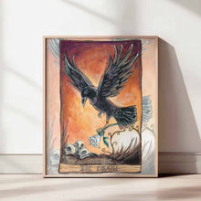 Load image into Gallery viewer, an art print of the death tarot card, from the animism tarot: a raven rises up against a sunset sky, holding a white rose, while raven skulls sit below.
