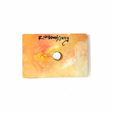 Load image into Gallery viewer, back of the wood magnet, signed with RainbowofCrazy. a small round magnet is attached
