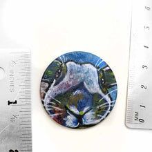 Load image into Gallery viewer, a small round wood disc, hand painted with a portrait of an English Spot rabbit, face up close, painted in rainbow colours. it's available as a keepsake or pendant necklace

