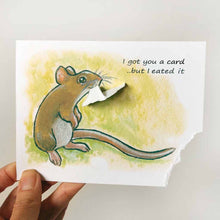 Load image into Gallery viewer, a greeting card, illustrated with a smiling mouse. a corner of the card is ripped and hangs from the mouse's mouth. the text reads, I got you a card .. but I eated it
