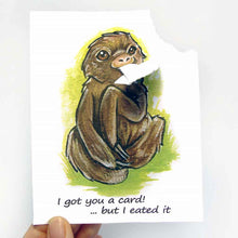 Load image into Gallery viewer, a greeting card with art of a sloth. The card reads, "I got you a card! ... but I eated it". the top right corner of the card is ripped and hangs from the sloth's mouth
