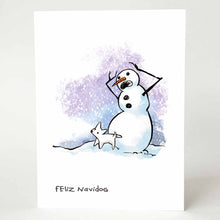 Load image into Gallery viewer, a greeting card that says "feliz navidog" with an illustration of a snowman, arms up, mouth agape, looking horrified, as a little white dog stands at the base of the snowman, hind leg lifted up, as if it's about to pee
