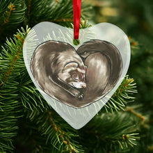 Load image into Gallery viewer, a heart shaped glass ornament, featuring an illustration of a ferret, curled up in the shape of a heart

