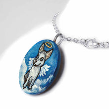 Load image into Gallery viewer, a lightweight wood disc, hand painted with a portrait of a husky dog as an angel in the clouds against a blue sky. available as a keepsake or pendant necklace
