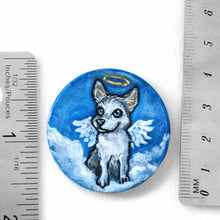 Load image into Gallery viewer, a lightweight wood disc, hand painted with a portrait of a husky dog as an angel in the clouds against a blue sky. available as a keepsake or pendant necklace
