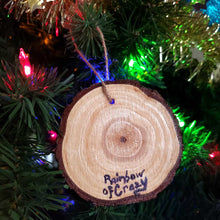 Load image into Gallery viewer, a wood ornament hand painted with a close-up portrait of a husky dog, smiling really big, back signed with, rainbowofcrazy 
