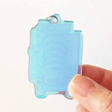 Load image into Gallery viewer, Back of the cat keychain, showing the blue tinted acrylic
