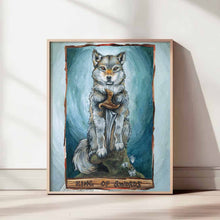Load image into Gallery viewer, An art print of the King of Swords from the Animism Tarot. It features a grey wolf sitting on the top of a cliff, with a sword set in front of him.
