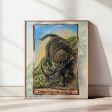 Load image into Gallery viewer, Art print of the knight of pentacles card, from the Animism tarot: a black rhinoceros comes down from a hill.
