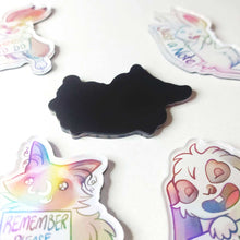Load image into Gallery viewer, The back of the cat magnet, showing a full rubber magnet backing.
