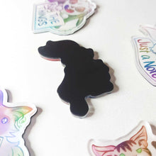 Load image into Gallery viewer, The back of the rabbit magnet, showing a full rubber magnet backing.
