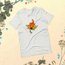 Load image into Gallery viewer, t-shirt in the colour ash (light grey) featuring a smiling maple leaf
