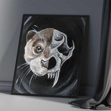 Load image into Gallery viewer, A framed art print featuring a split image with a portrait of an otter's face on the left side and a depiction of an otter skull on the right side.
