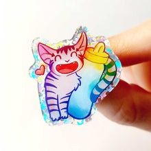 Load image into Gallery viewer, sparkly acrylic pin of a smiling cartoon tabby cat snuggling up to a large water bottle. a small heart appears next to the cat.
