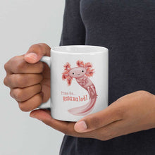 Load image into Gallery viewer, hands holding a white ceramic mug, 11 oz size, with an illustration of a smiling axolotl next to the text "Time to.. Relaxalotl"
