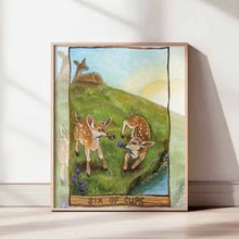 Load image into Gallery viewer, an art print of the six of cups tarot card from the animism tarot. two baby deer play in with crocus flowers in a field, with their mother watching over them in the distance.
