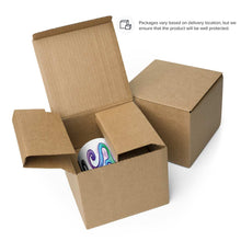 Load image into Gallery viewer, The Slender Man Love mug, shown in a cardboard box for shipping. "Packages vary based on delivery location, but we ensure that the product will be well protected."
