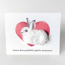 Load image into Gallery viewer, a greeting card with illustration of a snowshoe on front of a giant heart, its body made with fluffy white yarn. the card reads, "Some-bunny thinks you're special!"
