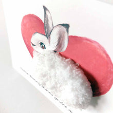 Load image into Gallery viewer, a greeting card with illustration of a snowshoe on front of a giant heart, its body made with fluffy white yarn. the card reads, "Some-bunny thinks you're special!"

