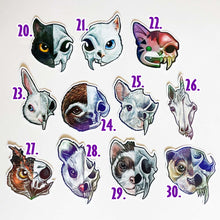 Load image into Gallery viewer, 11 stickers featuring rabbit/skull designs. 20) black cat. 21) white cat. 22) cartoon tabby. 23) white rabbit. 24) sloth. 25) chinchilla. 26) unicorn. 27) owl. 28) possum. 29) ferret. 30) otter.
