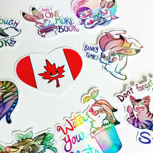 Load image into Gallery viewer, Colorful cartoon animal stickers including a heart-shaped Canadian flag sticker with a smiling red maple leaf, rabbits and cats.
