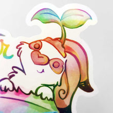 Load image into Gallery viewer, sticker featuring an english spot rabbit (from Rainbow of Crazy Comics) in a plant pot. a seedling sits on top of the rabbit's head. the sticker has the words "Water Your Plants".
