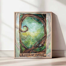 Load image into Gallery viewer, This art print features the Wheel of Fortune tarot card from the Animism Tarot: a beautiful spider web sits in the curved branches of a tree. An orb weaver spider rests at the bottom of the web.
