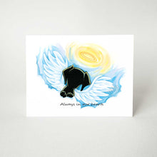 Load image into Gallery viewer, A greeting card with a black dog angel on the front, that reads, "Always in our hearts"
