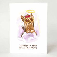 Load image into Gallery viewer, A greeting card with an illustration of a Yorkshire Terrier as an angel, wearing star shaped sunglasses and a red bow on its head, it sits on purple clouds. The card reads, "Always a star in our hearts"
