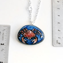 Load image into Gallery viewer, the cancer crab necklace, next to two rulers to show its size: 1 3/8" x 1" - or - 3.5 cm x 2.6 cm
