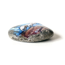 Load image into Gallery viewer, Rock art featuring a painting of a ram on a mountain, in front of a cloudy blue sky. The symbol for Aries is painted on the bottom.
