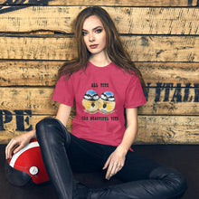 Load image into Gallery viewer, A woman wearing the Beautiful Tits Premium Unisex T-shirt in heather raspberry with art of two blue tit birds, and the words, "all tits are beautiful tits"
