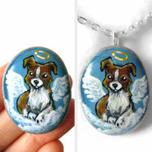 Load image into Gallery viewer, Small rock art of a border collie, painted as an angel, with halo and wings, sitting on clouds. available as a keepsake or pendant necklace
