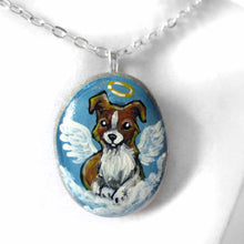 Load image into Gallery viewer, Small rock art of a border collie, painted as an angel, with halo and wings, sitting on clouds. available as a keepsake or pendant necklace
