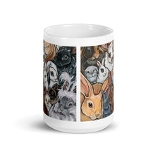 Load image into Gallery viewer, A 15 oz white ceramic mug, printed with artwork of many different types of bunny rabbits
