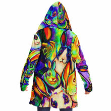 Load image into Gallery viewer, a woman wears the bunny lovers rainbow cloak, featuring a bright, all-over rainbow print of different rabbit breeds
