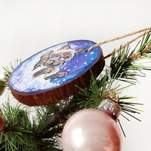 Load image into Gallery viewer, A Christmas tree wood ornament, hand painted with art of a Himalayan cat sleeping on snow.
